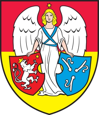 Herb z aniołem w białej szacie o złotych włosach i rozpostartych białych skrzydłach, stojącym przodem. Anioł trzyma dwa herby: po lewej czerwony z białym lwem w koronie i małą złotą gwiazdą nad nim, po prawej niebieski z trzema białymi, zakrzywionymi strzałami skierowanymi do środka. Tło tarczy u góry czerwone, u dołu żółte; anioł ma niebieski pas przez pierś i złotą gwiazdę nad głową.